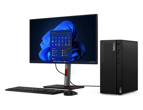 Lenovo ThinkCentre M70t Gen 4 (Intel) Desktop-Tower – Ansicht von schräg vorne rechts mit Monitor, kabelloser Tastatur und kabelloser Maus, nicht im Lieferumfang enthalten